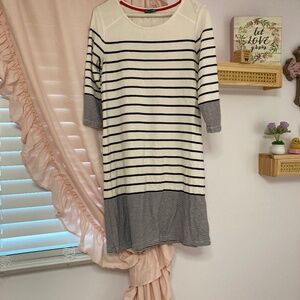 Causal stripped dress . Few small marks that may come up out in wash .